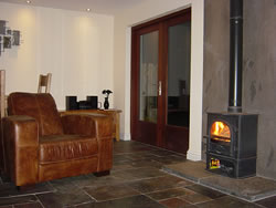 The wood burner in the sitting room at Kingston House
