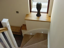 Curved skirting and lighting on the unique Kingston House staircase