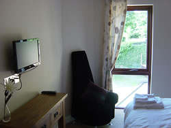 All bedrooms are equipped with flat-screen televisions